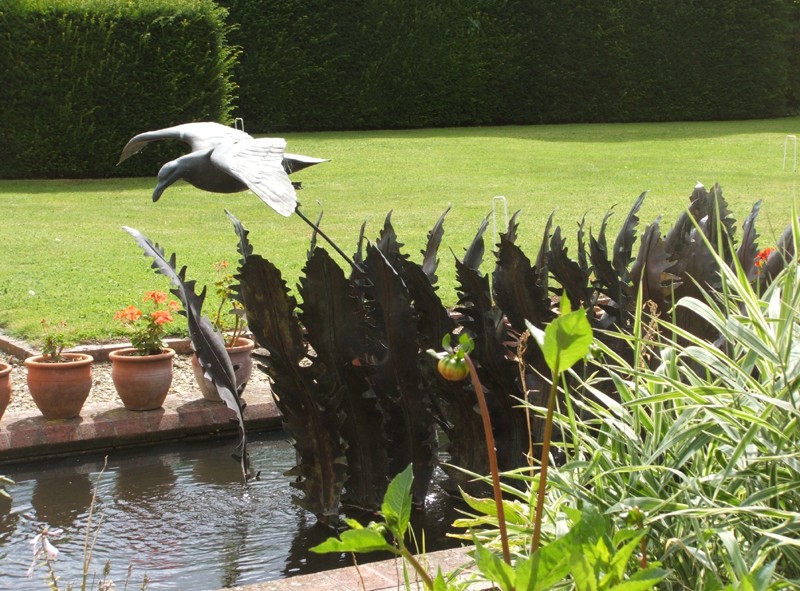 ... a water feature with fern fronds from the Downs �      (Click to enlarge)