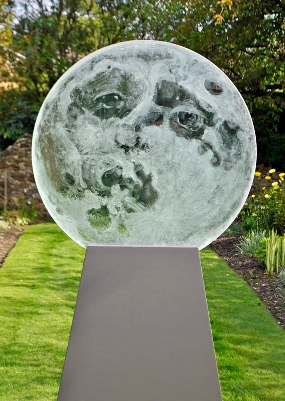 GLINT OF LIGHT ON BROKEN GLASS